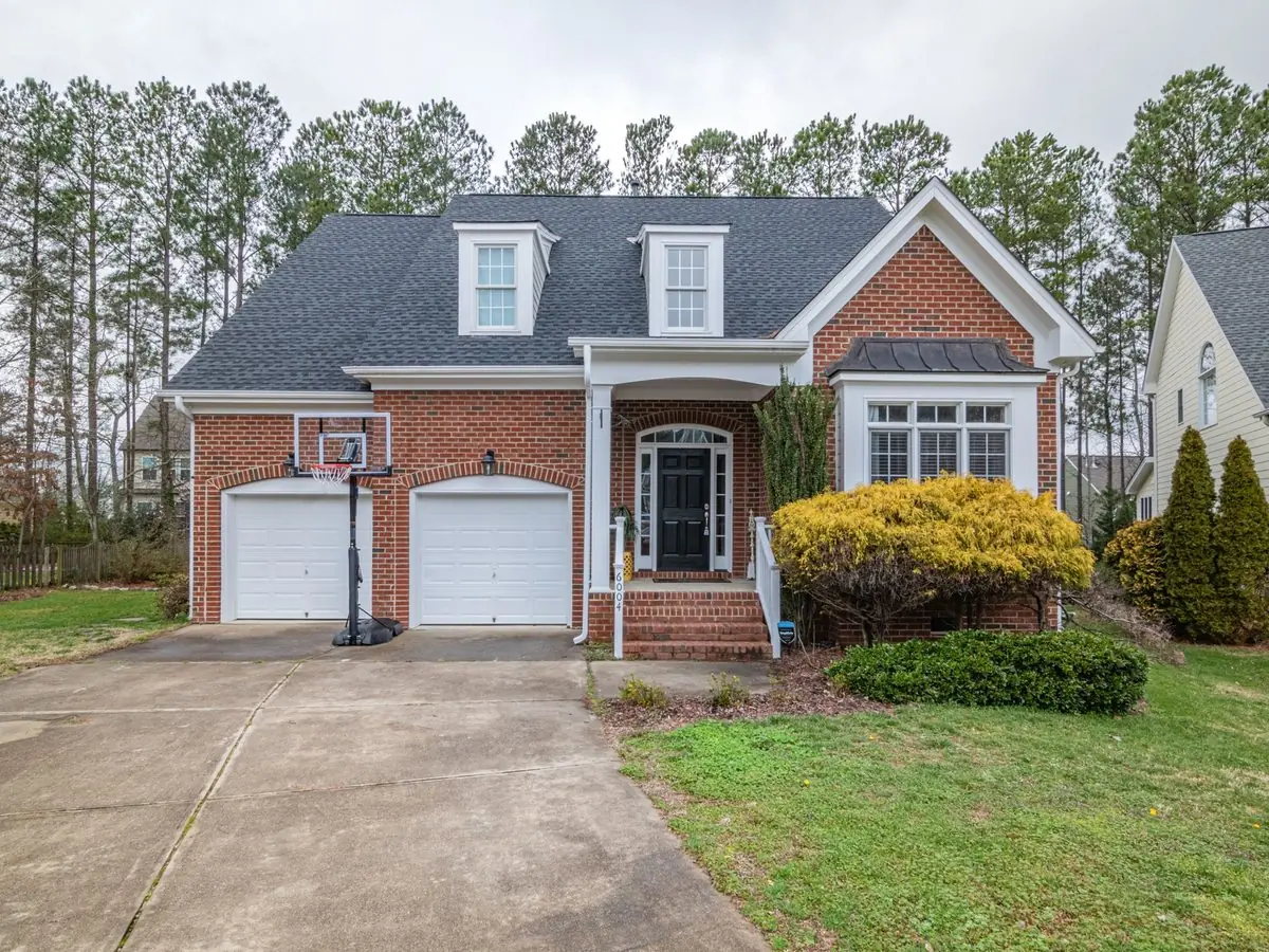 Brick home with an attached garage, typical of the slab-on-clay houses across Cedar Hill and the Best Southwest